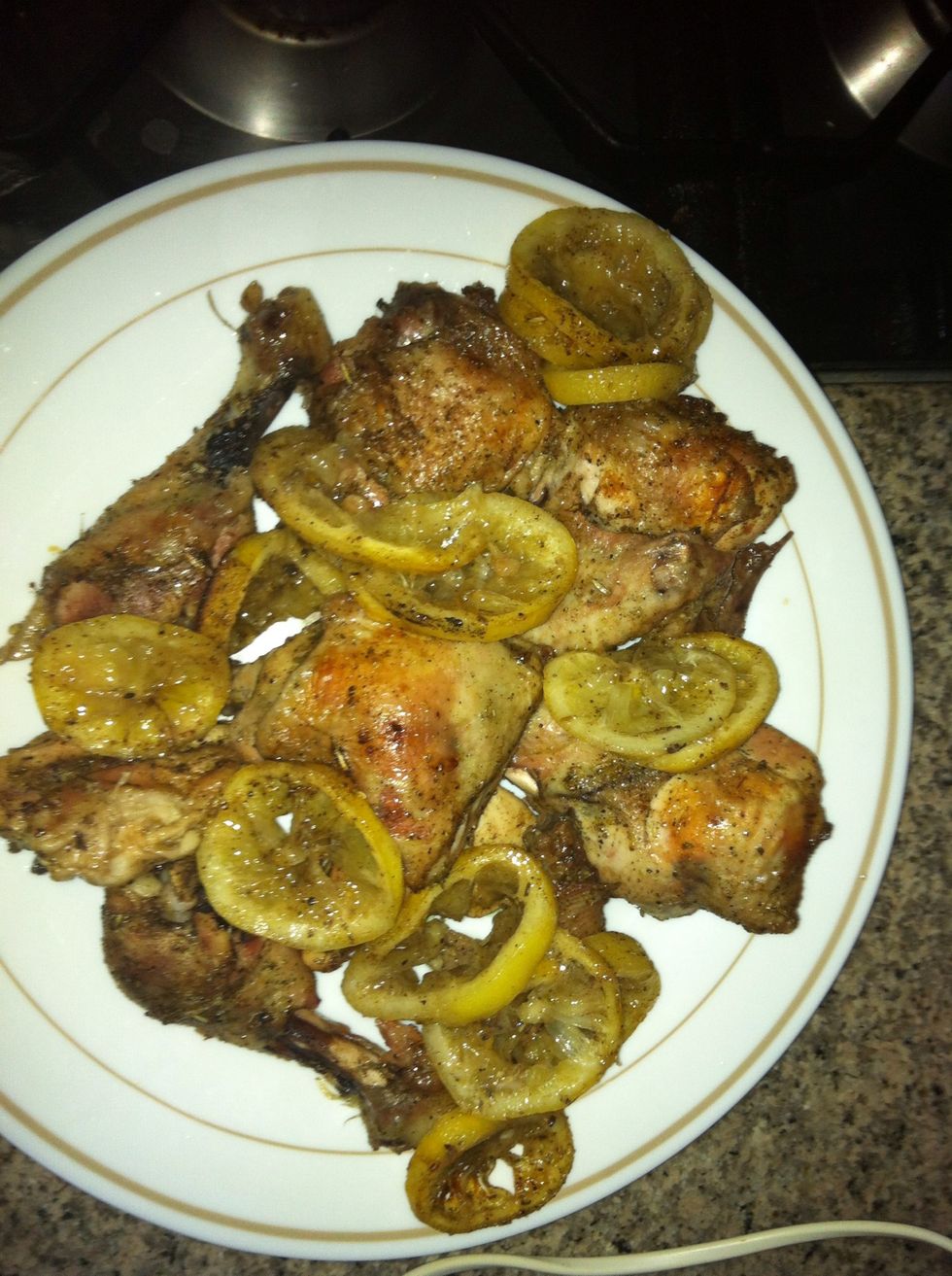 Arrange the chicken and lemon slices on a serving plate. I love to serve the lemons, they become soft and you can even eat the skins too. It's tangy and bitter, yum!