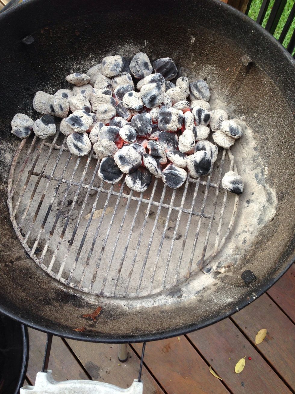 Arrange the coals to one side for indirect grilling.