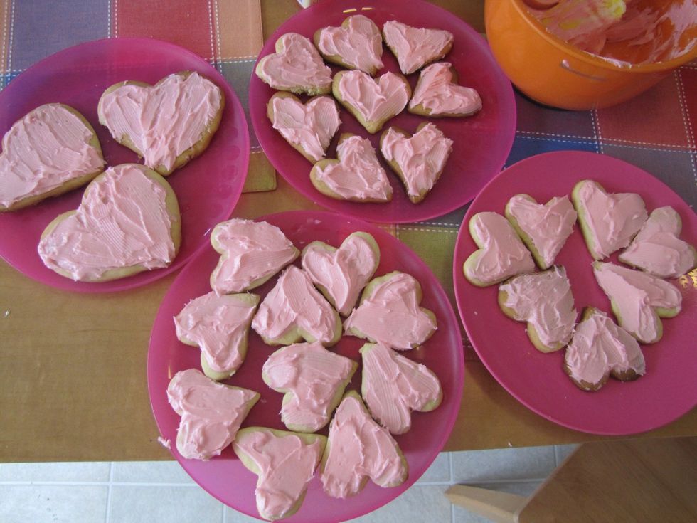 Arrange the cookies on plates for further decoration. Make sure not to overlap them while they're still drying.