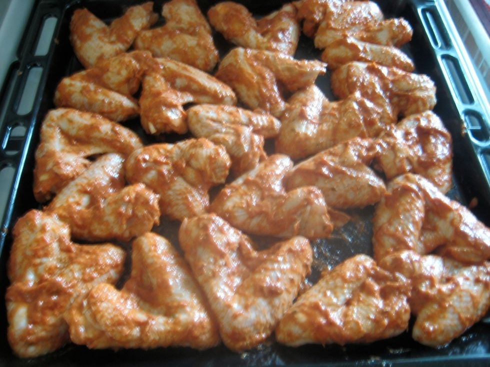 Arrange the meat on a baking tray without overlapping. Cook in the preheated oven for 10 minutes then turn the pieces over and cook for a further 15 minues or till cooked and have an even brown color