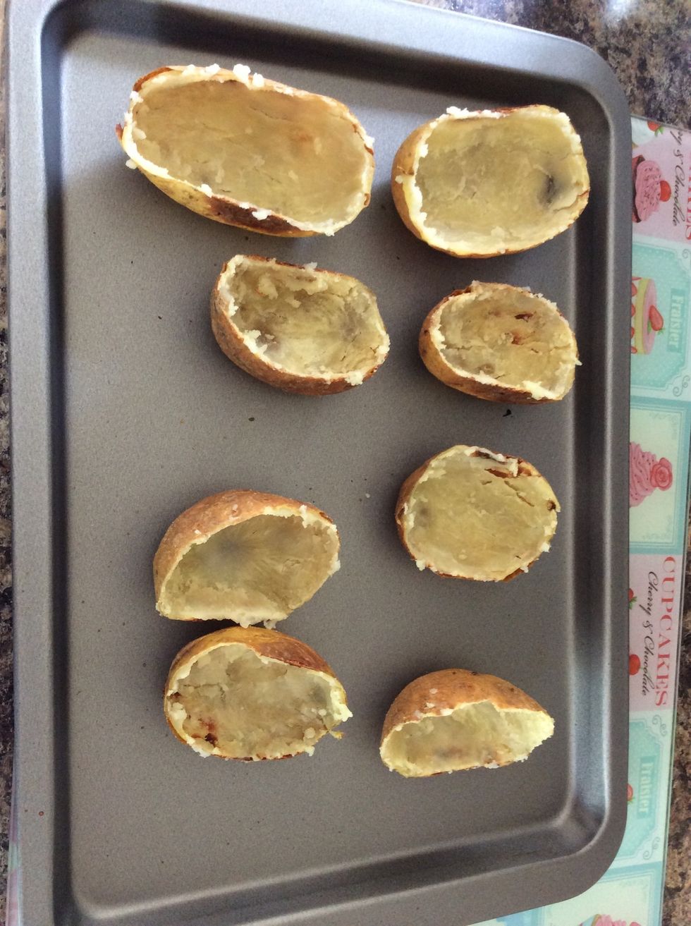 Arrange the skins onto the baking sheet and let cool