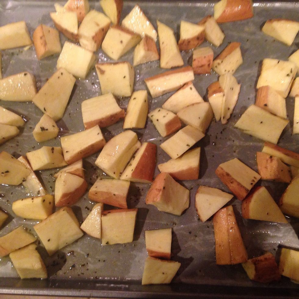 Arrange the sweet potatoes on a large baking sheet so they are not touching. Bake in upper part of oven for 20 minutes, turning once or until softened and lightly brown.