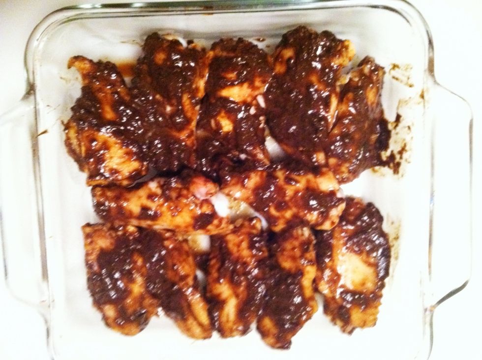 Arrange the wings in a baking tray and brush with jerk seasoning. Bake in an 350 degree oven for 45 minutes or until cooked. Do not roast because the seasoning will burn.