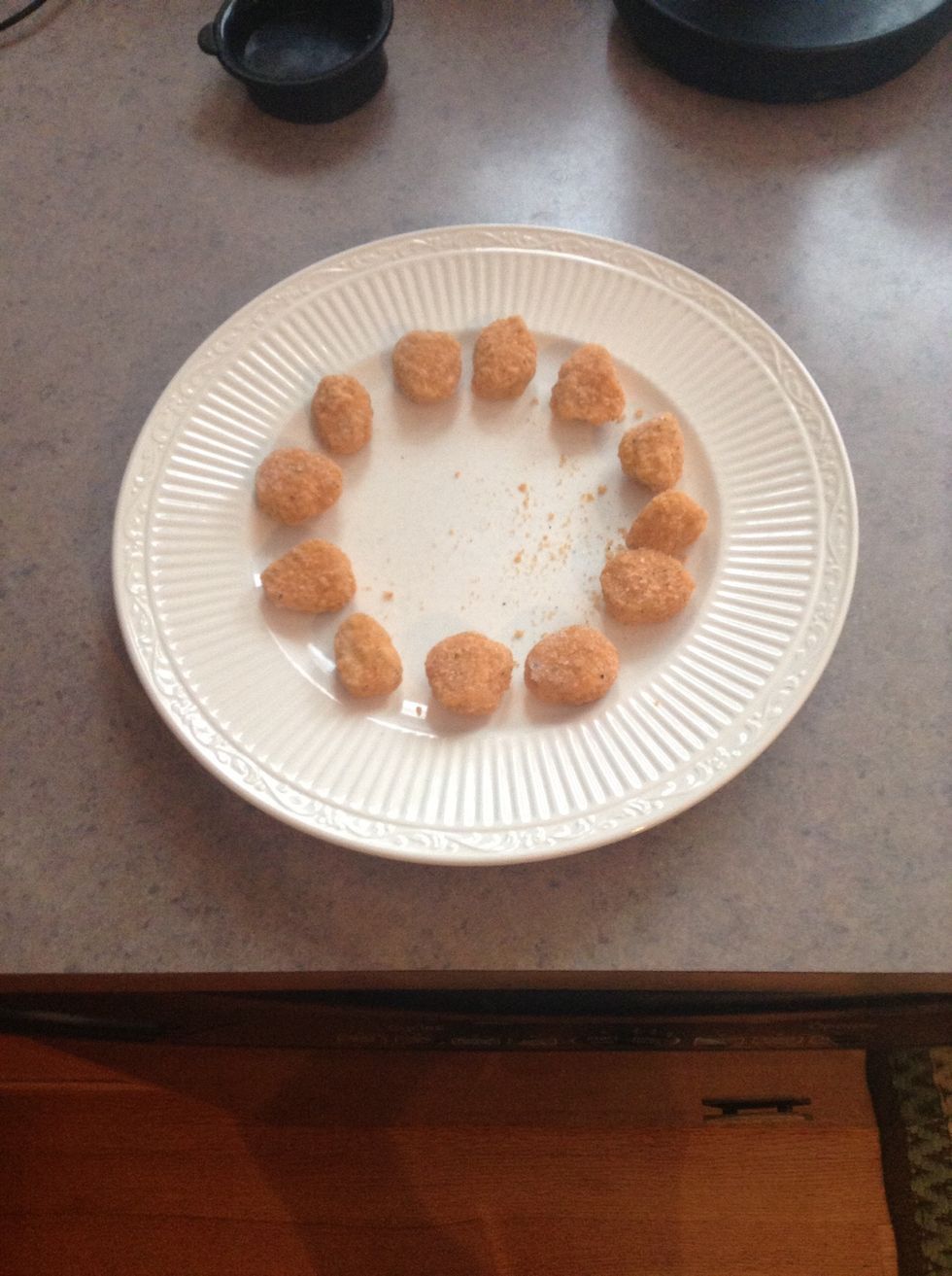 Arrange you chicken in a circle for even heating and use given directions on the bag