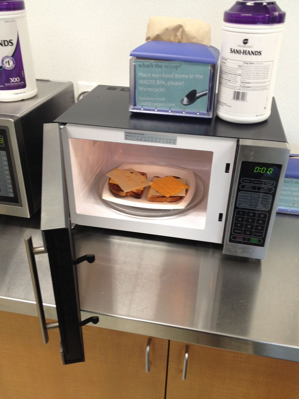 Arrange your cheese on your freshly-toasted bread and stick that ish in the microwave. I find that around 30-35 seconds is about right.