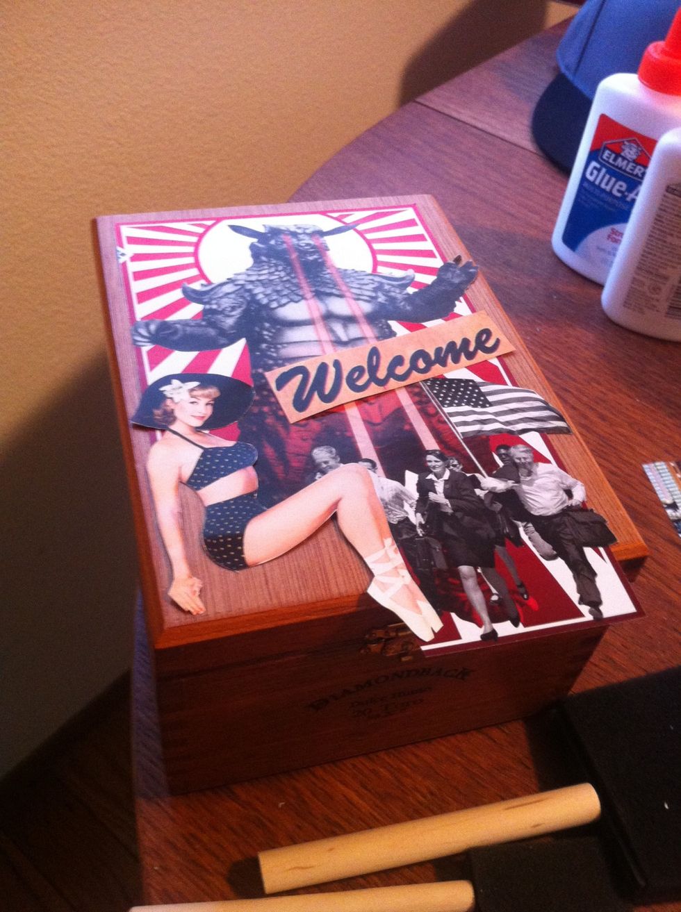 Arrange your finished clippings on the cigar box.