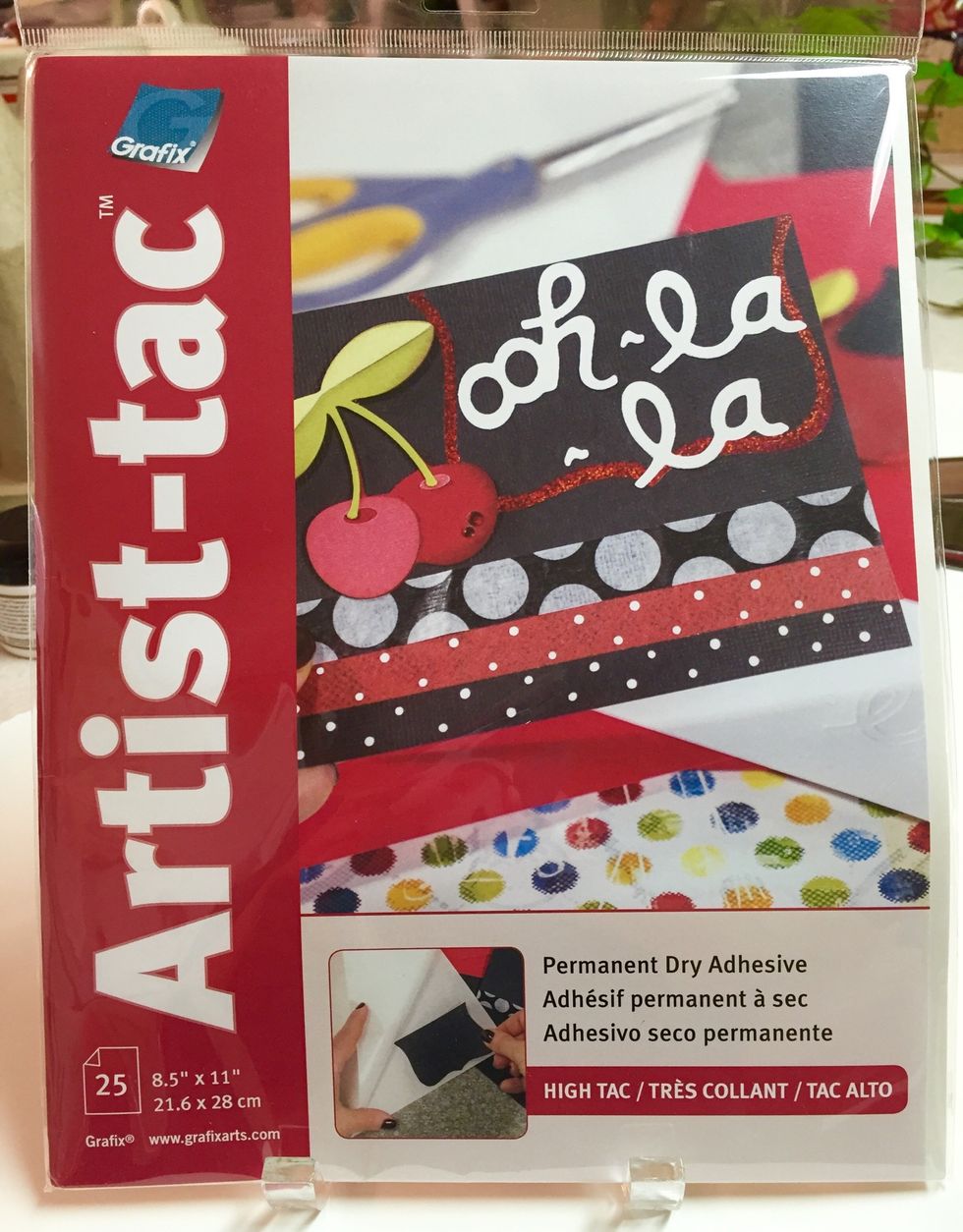 ARTIST-TAC by Grafix is a permanent dry adhesive that is neat, clean and easy to use. it comes in sheets that can be cut to size or punched or diecut for shapes.