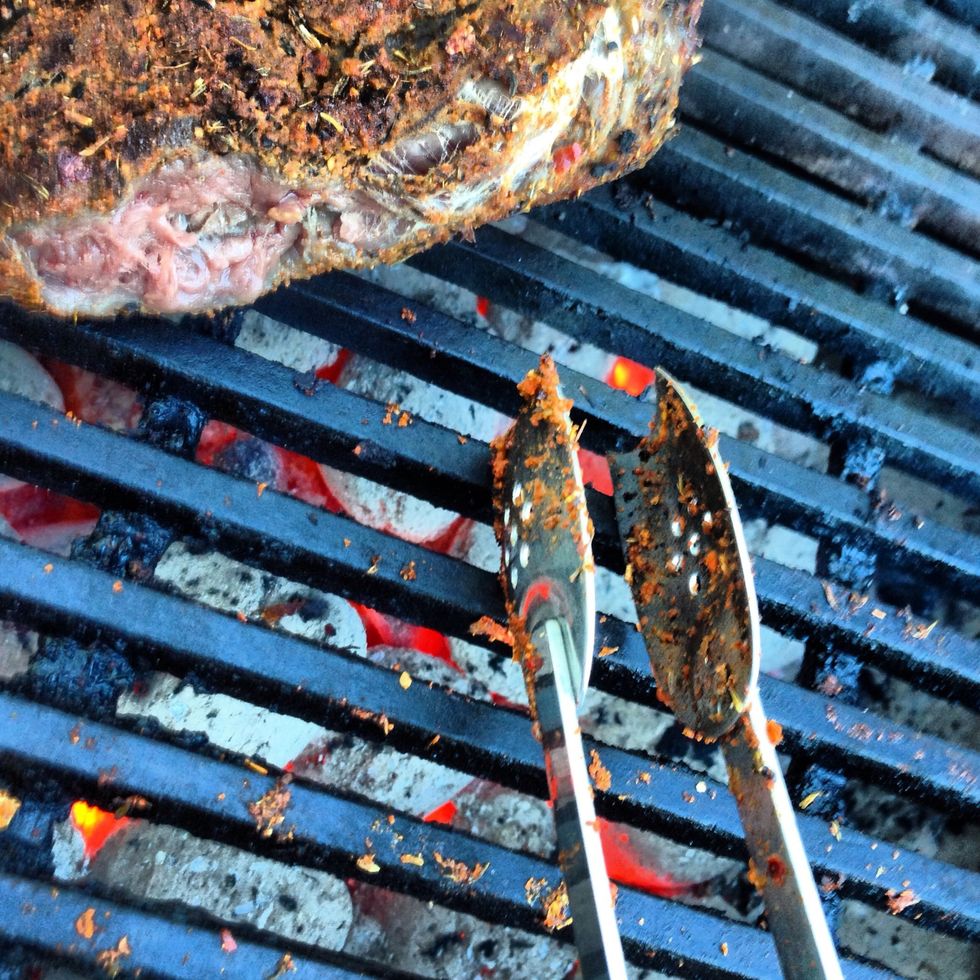 As a little hint if you scrape the excess rub from the bars you will entice some flames, they shouldn't last too long and will be enough to give the meat a smokey flavour.