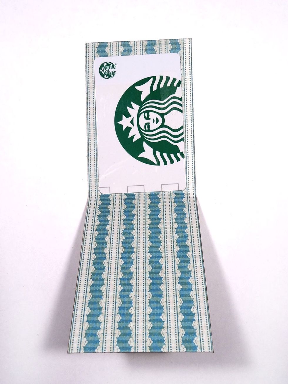 As an added feature, cut a piece of pretty paper 2 5/8" x 7 1/2" and fold at the center. Here is where you can insert a gift card, candy, money, whatever you like.