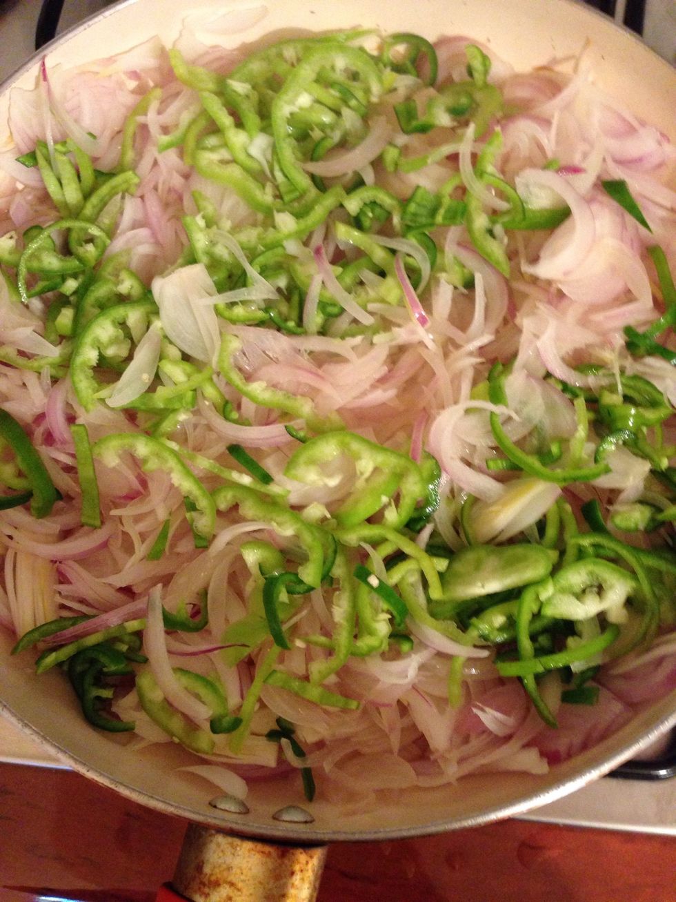As far as it is translucent add thinly chopped pepper and again cover