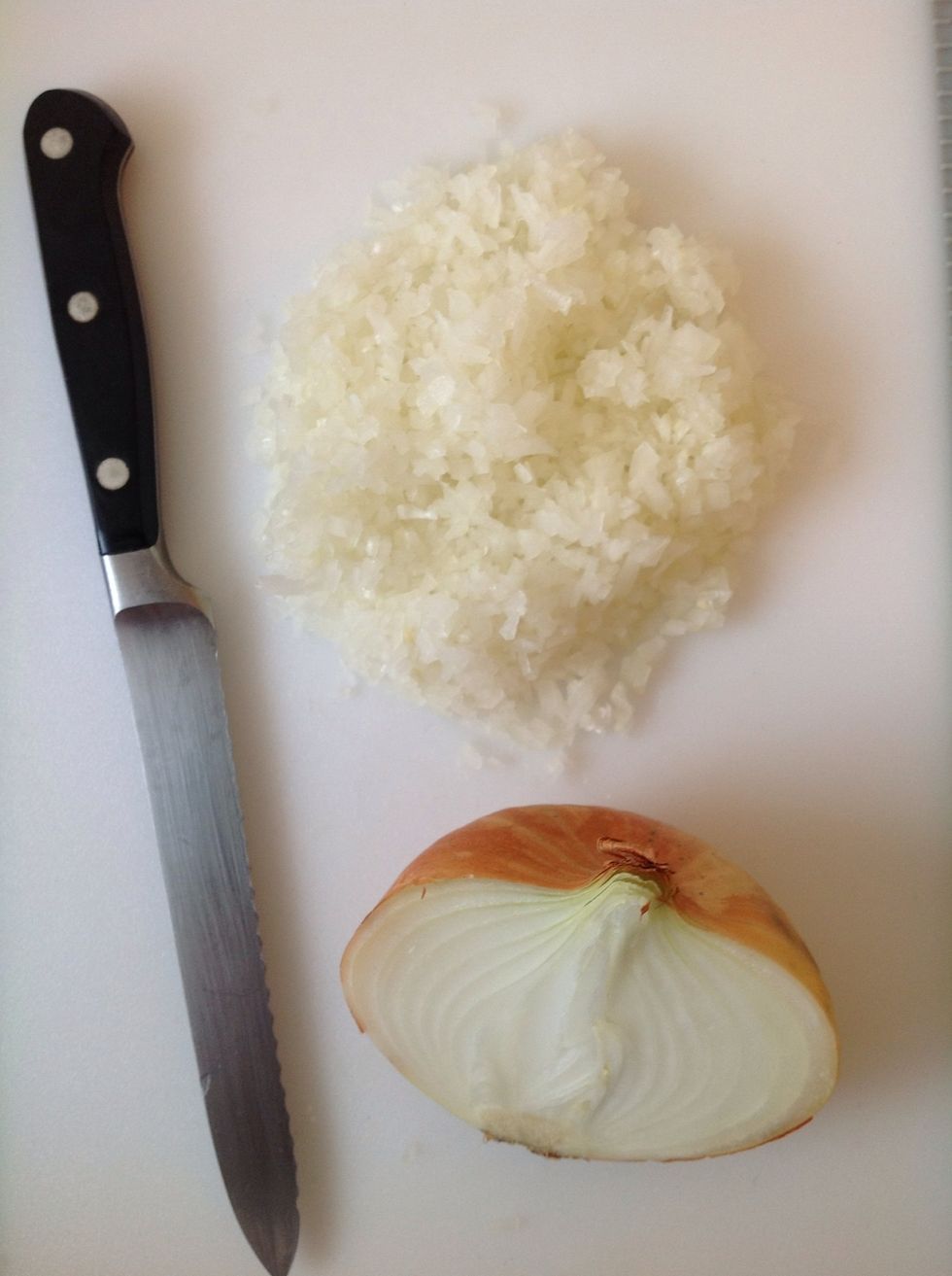 As finely as possible, chop the onion. There are many methods of doing this without your eyes burning.