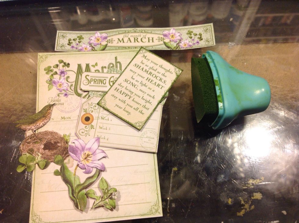 As I fussy cut each months papers inked them with coordinating chalk edger colors. I fussy cut details from the 12x12 pad too.