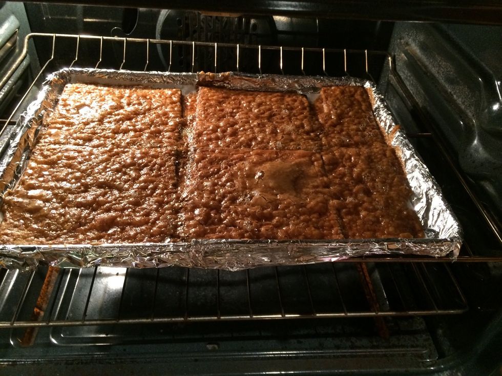 As it bakes, the butter and sugar mixture will bubble. Make sure that it is not burning. If it seems to be burning, reduce the heat to 325F