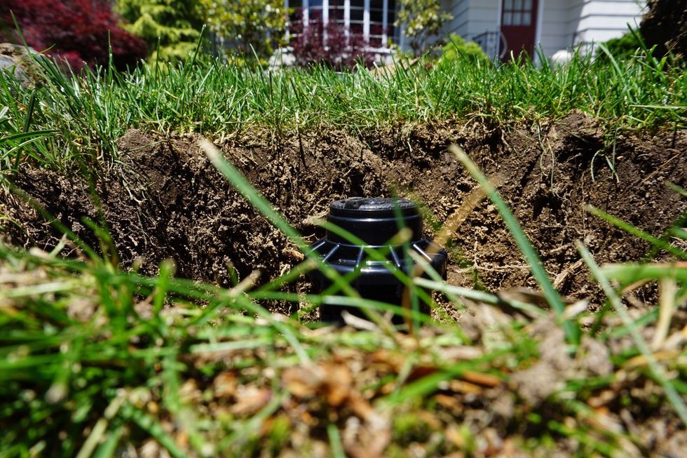 As mentioned earlier, the grass/soil grew above the previous head so I need to raise it. Here is the view of how low it is.