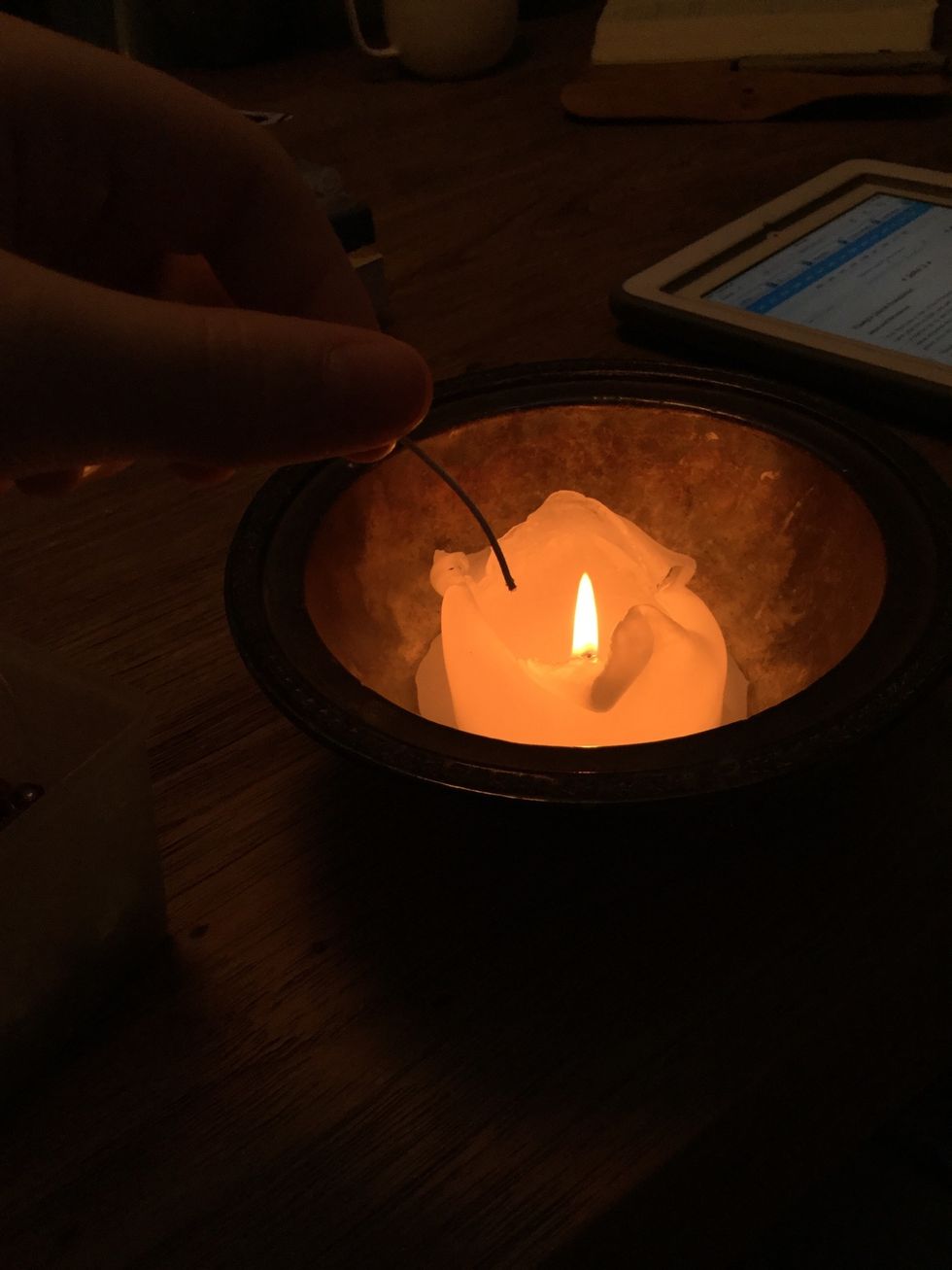 As quick as possible insert the string into a flame, to melt the end so it does not fray. (CAUTION: DO NOT DO THIS STEP IF YOUR STRING IN FLAMMABLE)
