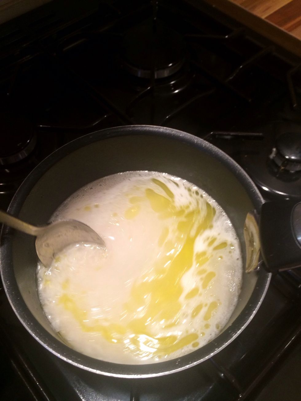 As rice boils stir and place lid on