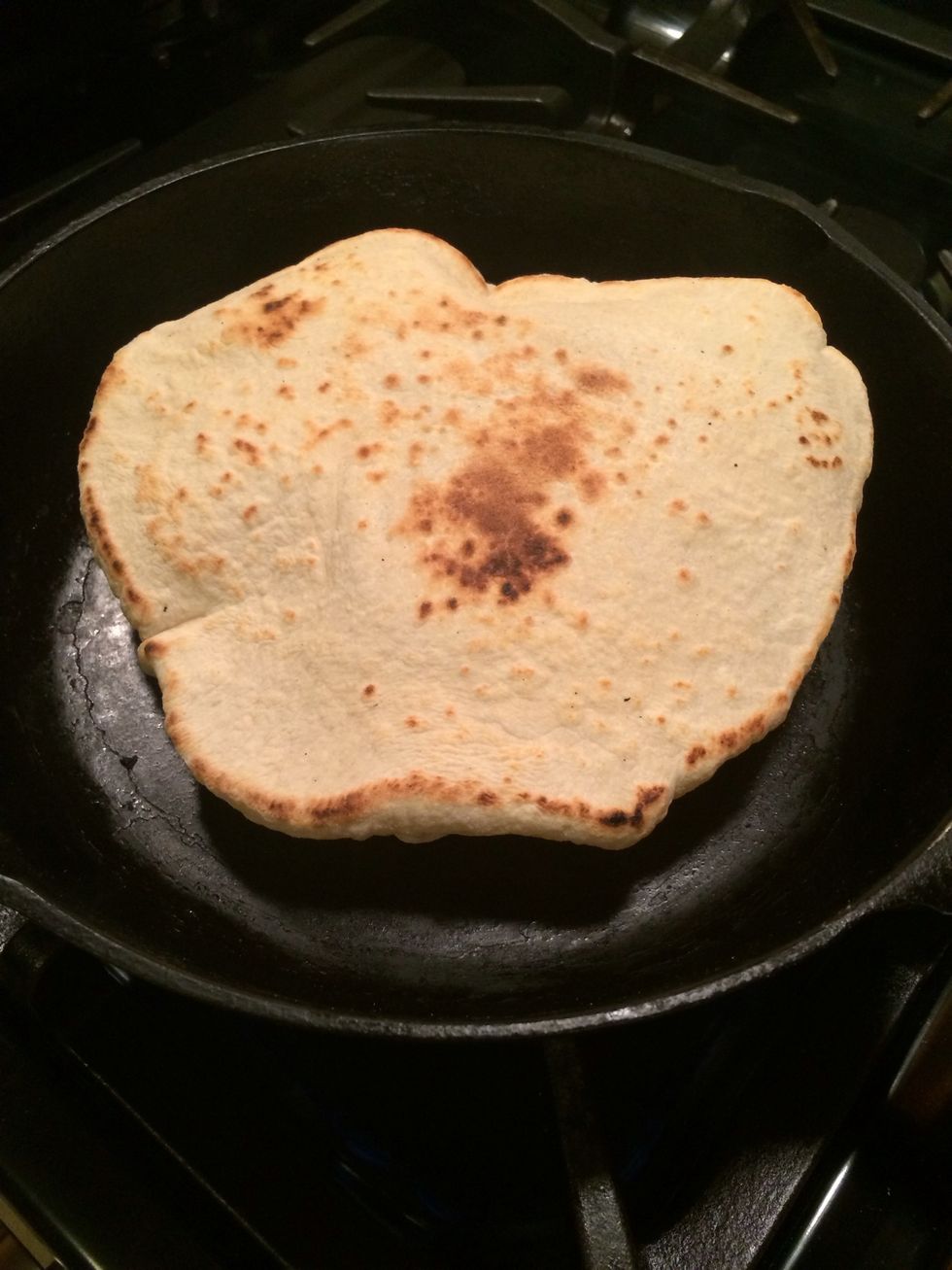 As soon as a pocket formed i turned it to brown the other side. yummyyyy. As soon as the pita brad is done put in a dish covered with a damp cotton towel.