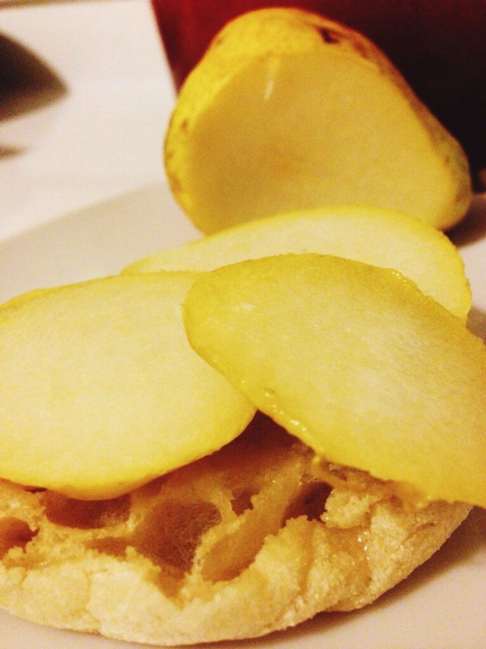As soon as the muffin pops up, butter and begin layering. Pear first...