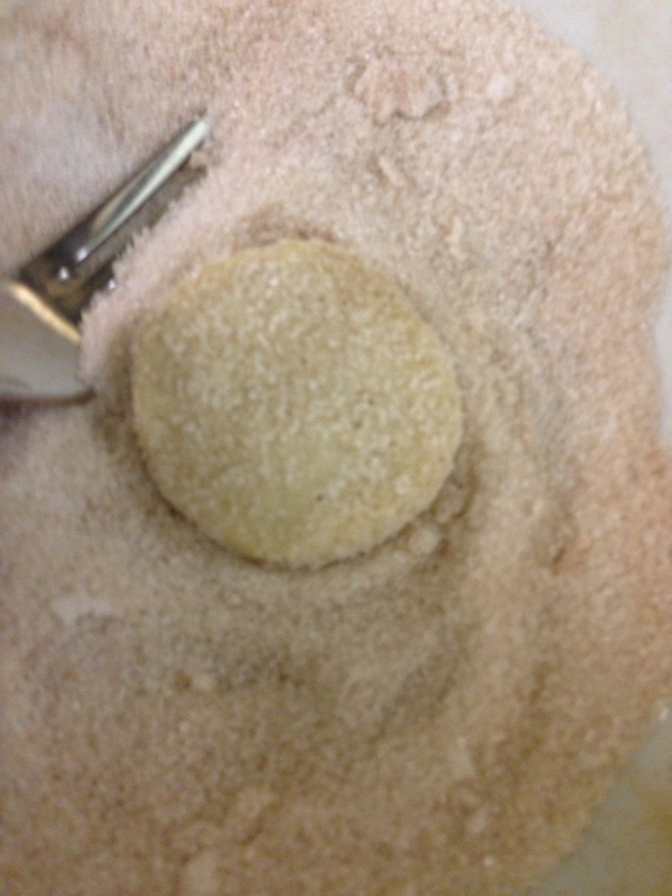 As soon as they'r out of the oven cover them with the sugar mix one by one on both sides