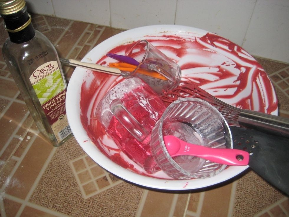 As the cake cooks, clear the mess : )