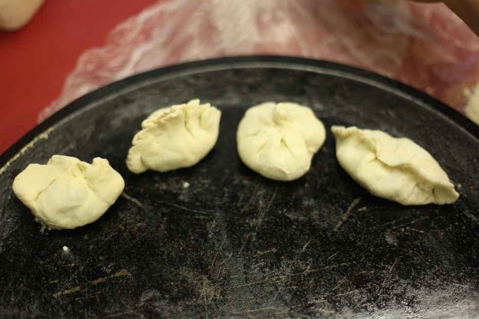 As the excitement builds, oil a baking tray with a tissue or spray with vegetable oil.