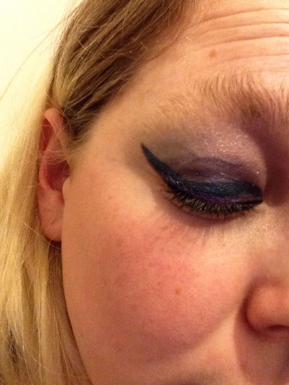 As the liner is the main feature in my look here I've used the darker shade all over the mid of my eye lid over the medium shade instead of just the inner corner. This is due to the line being thicker