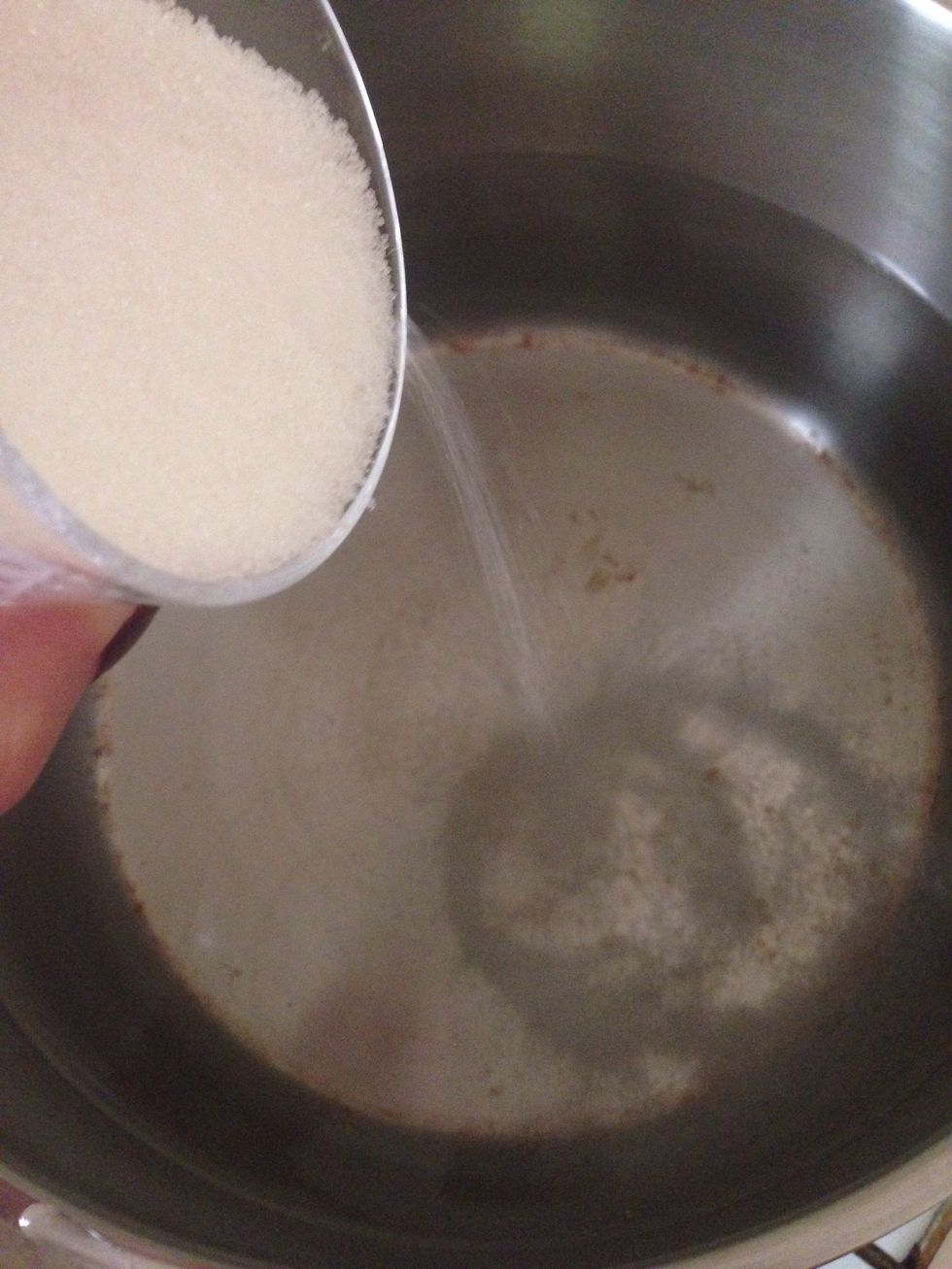 As the water starts simmering add the sugar stir once and let it come to simmer for the second time