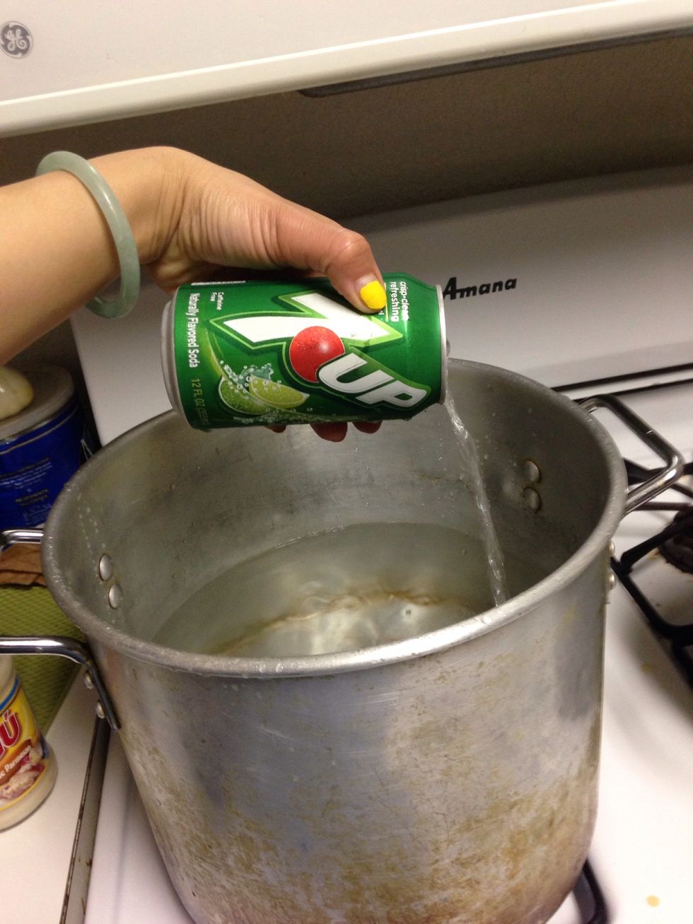 As water comes to a boil add can of 7up
