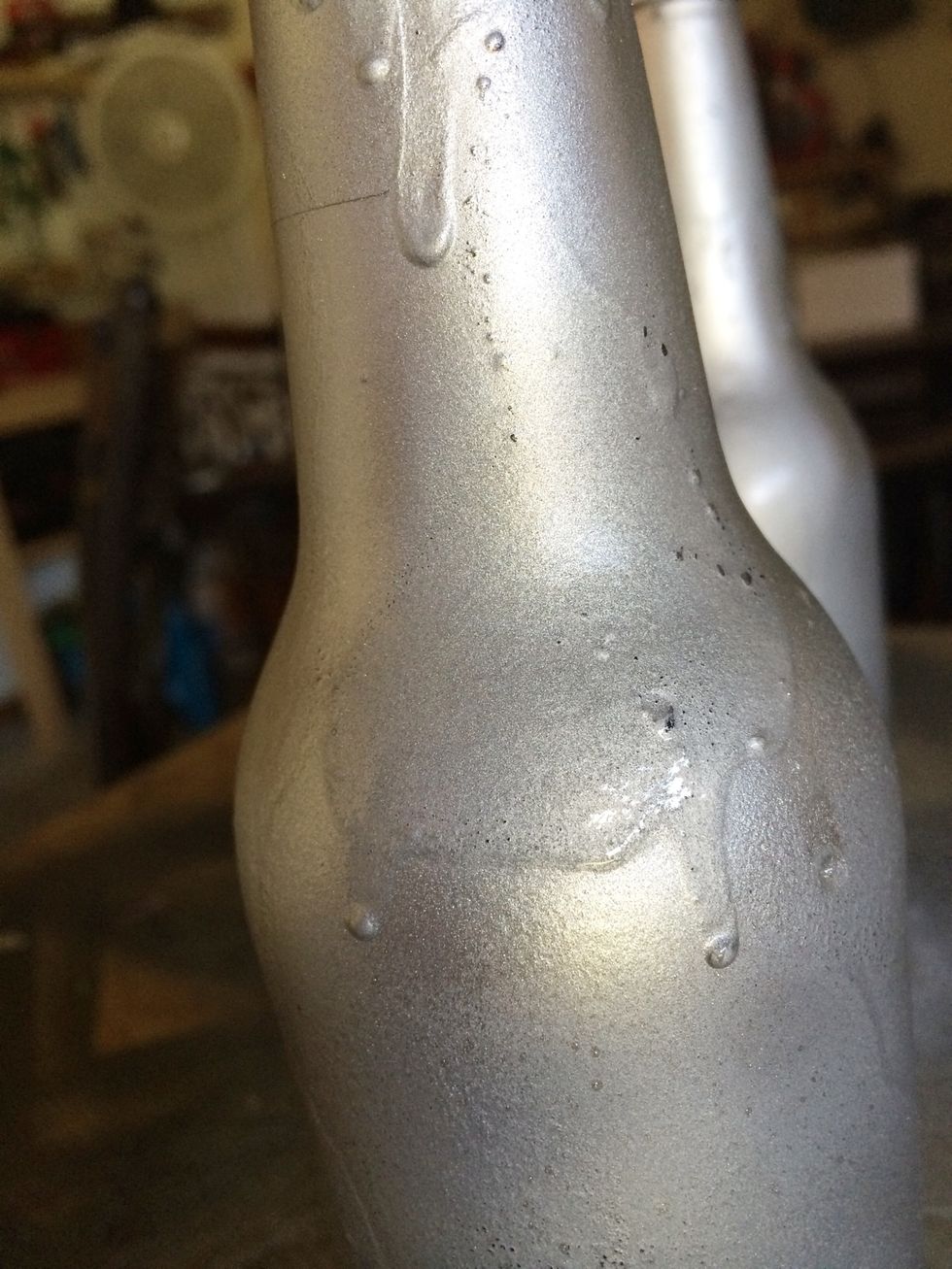 As with your larger bottle, hot some spots a little heaver so that it pools and drips down the side.