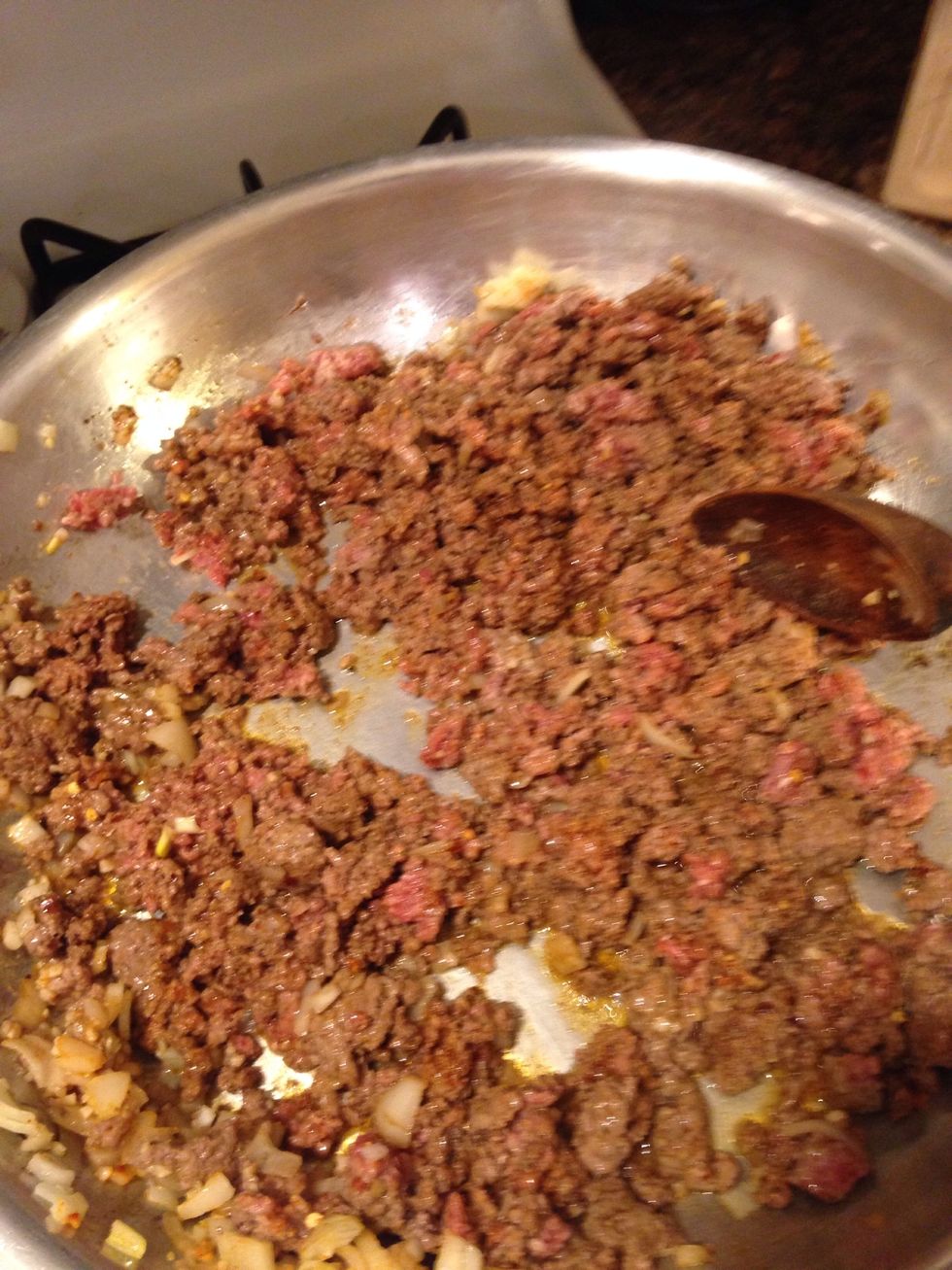 As you are browning the meat, add about a table spoon of each spice and just a pinch of salt. I don't really like adding too much salt to my food.