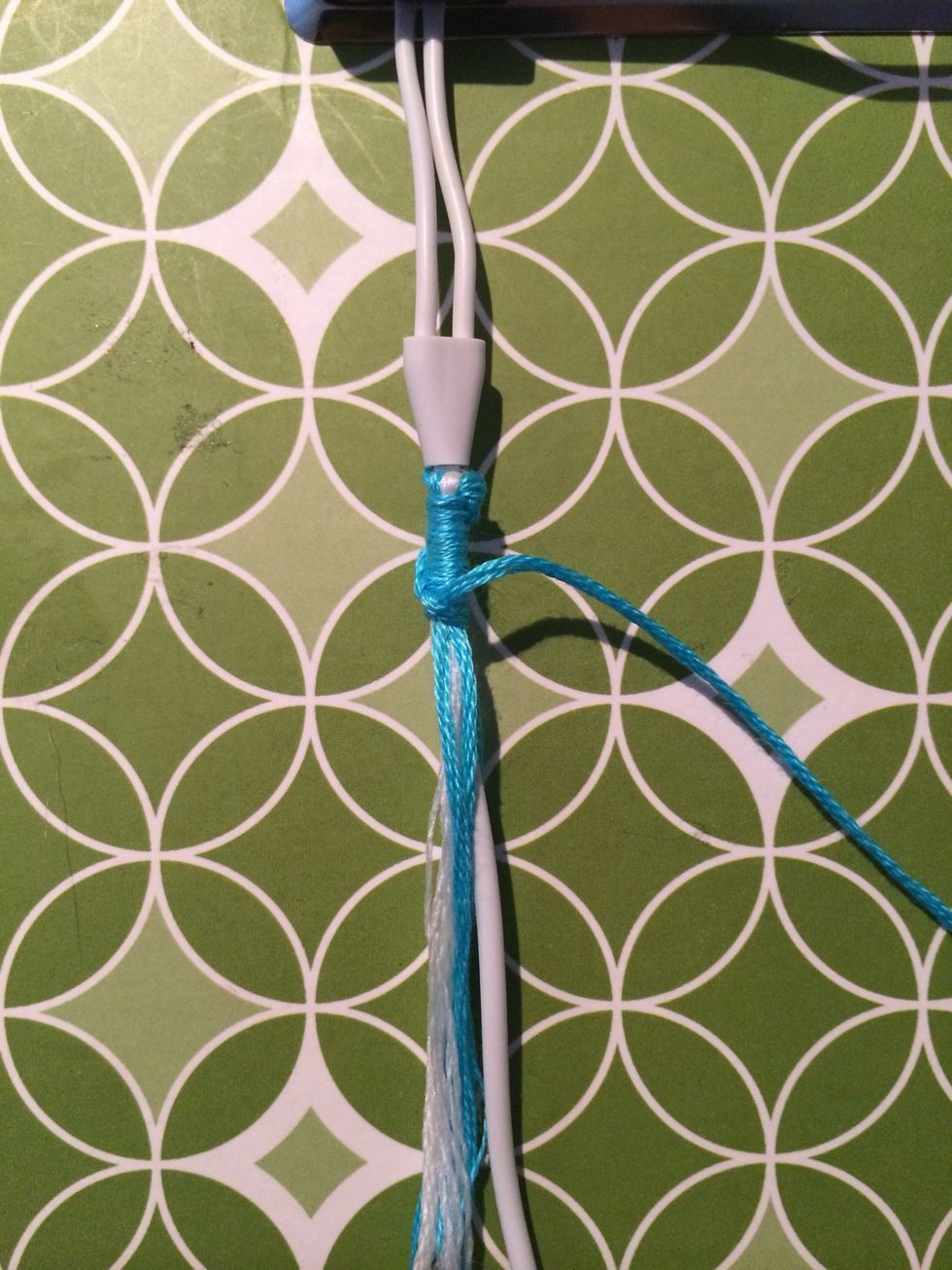 As you are making your first sets of knots you will want to make sure you are knotting over all of the string. So this is what it looks like after about 8-10 knots.