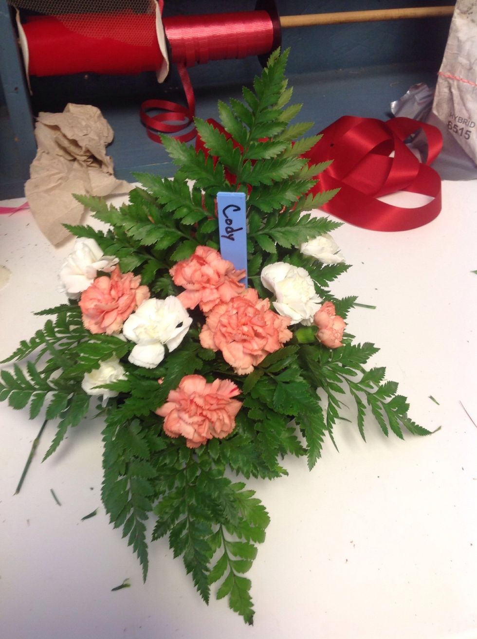 As you begin to complete your round mound arrangement you will we that the more variation of color between two color types you have the more it begins to look round and most likely extravagant.