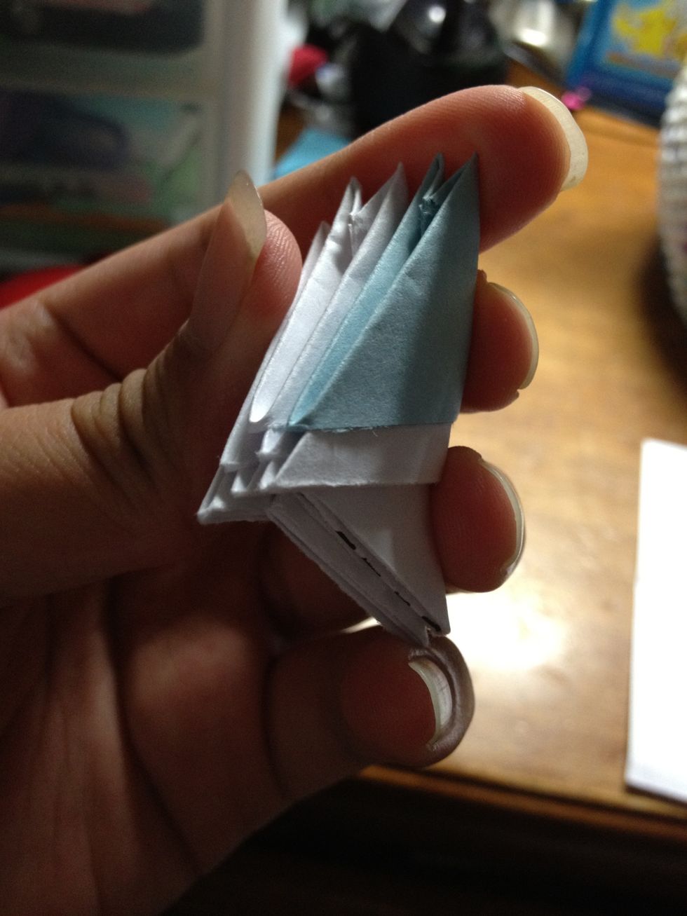 As you build the wings, every even layer will contain an end piece that is one short. So, every odd layer has a piece that overlaps the piece from the previous layer and the piece from two layers down