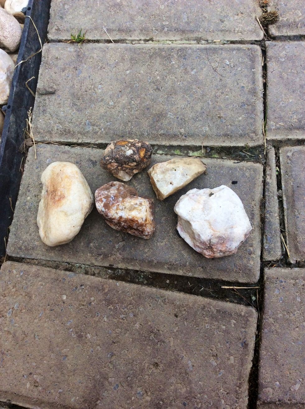 As you can see all the rocks have different colors in them. Not one is completely solid. This is because each rock has been weathered or worn down. Each rock has been worn down by what we call a