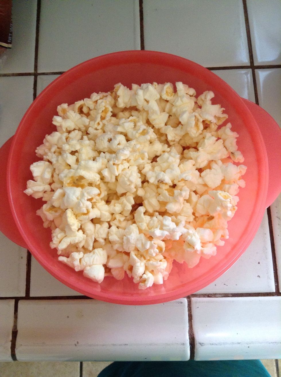 As you can see I've already put the popcorn in the microwave and the popcorn is ready to put the rest