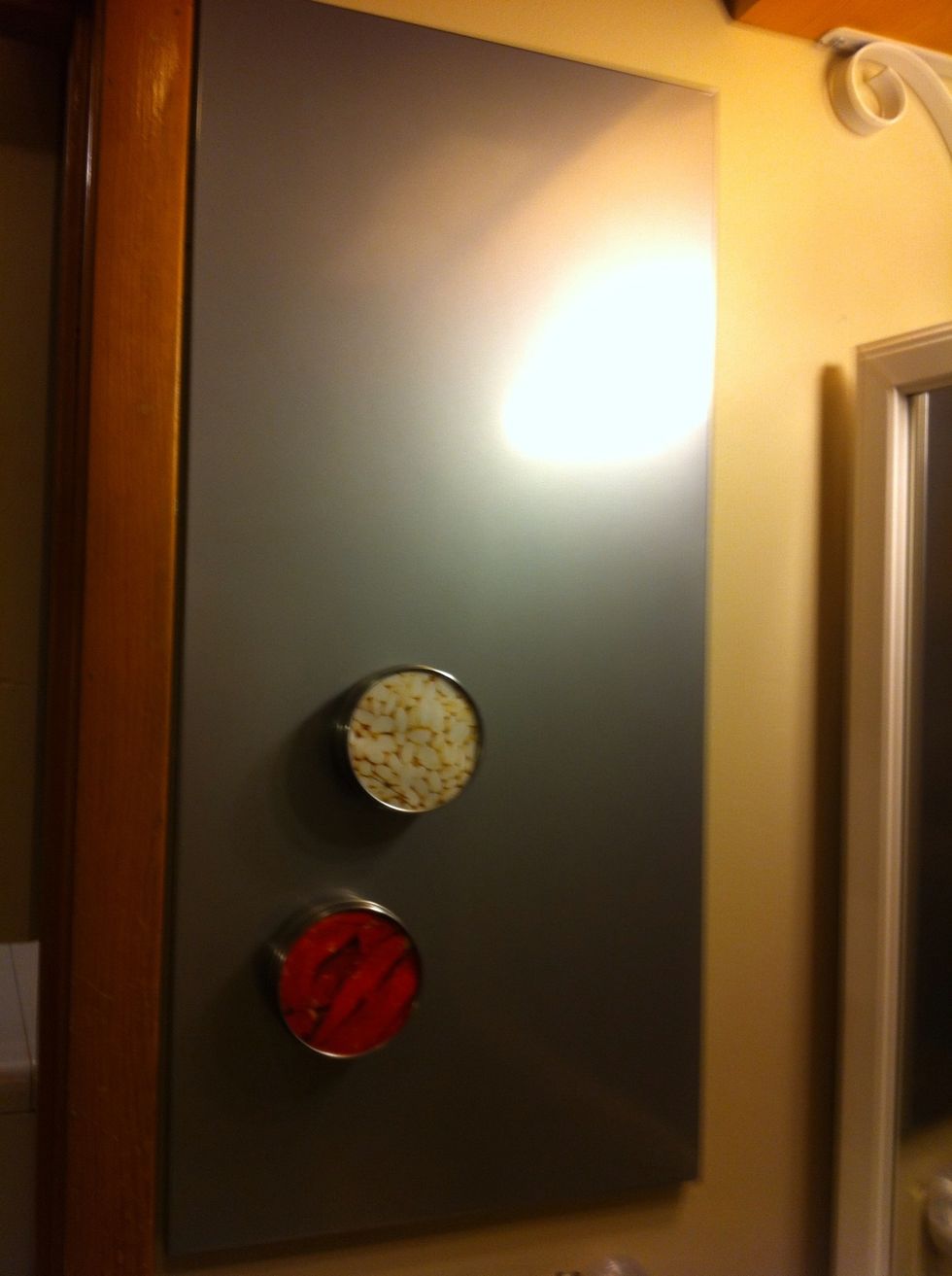 As you can see, the containers can just be placed on the board. These both are sold at IKEA in the kitchen section for spices.