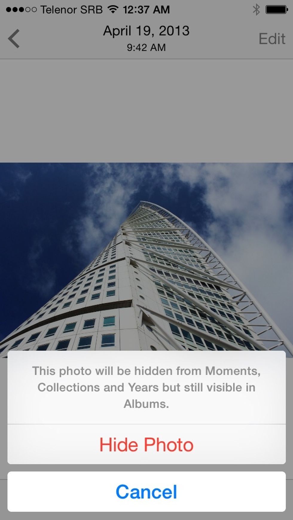 As you can see the photo will be hidden from Moments, Collections and Years, however, it will still appear in your Albums.