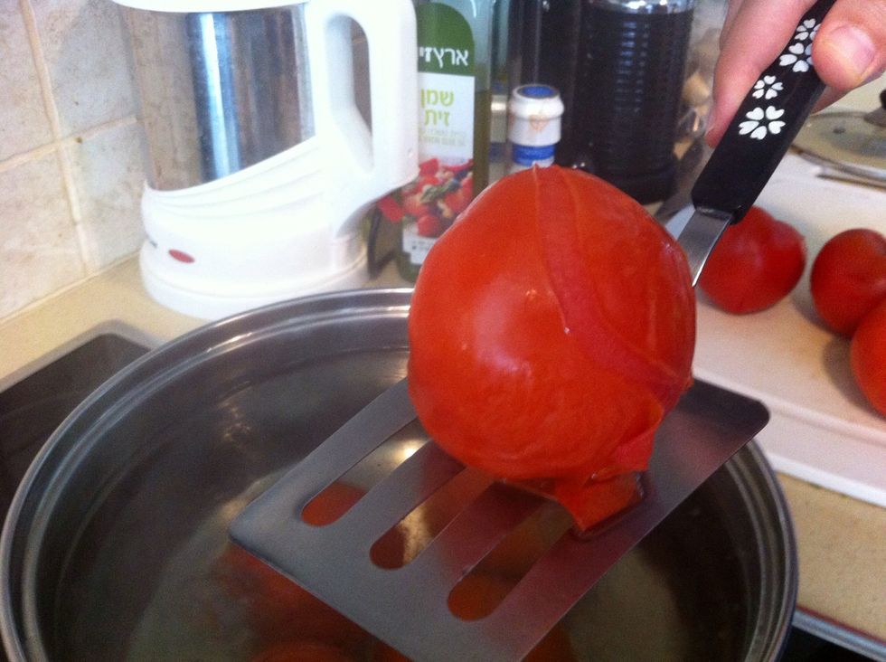 As you can see the tomato starts to peel by itself
