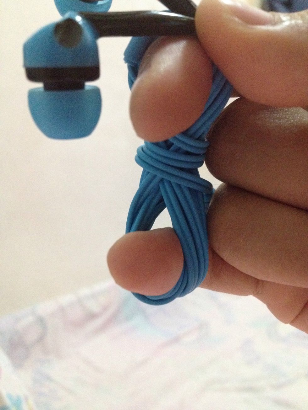 As you can see there's a small hole above the pinky. It's where you'll insert the jack plug.