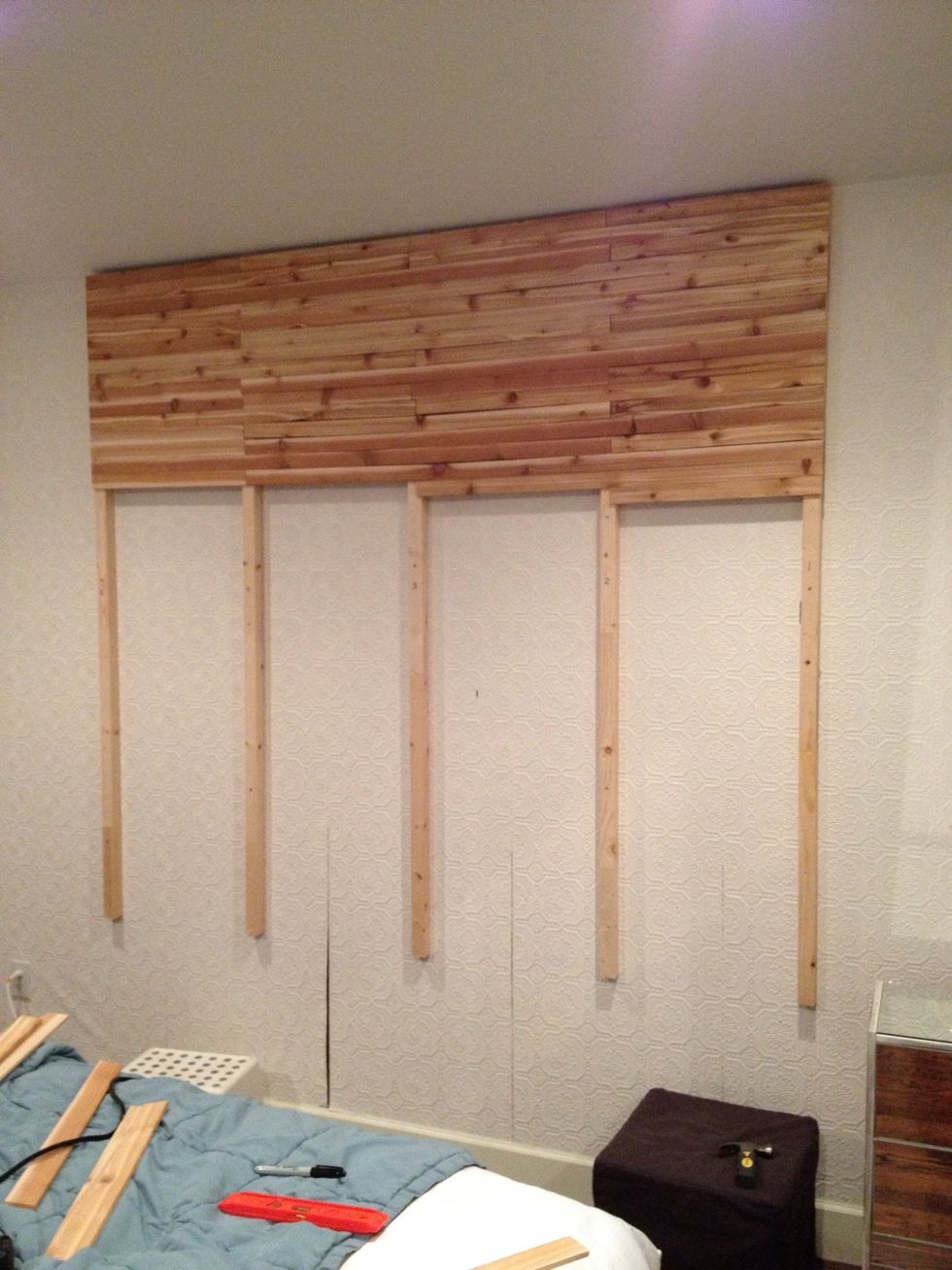 As you can see we are moving along filling the headboard from top to bottom. The lath pieces are simply nailed on with a plug in brad nailer.