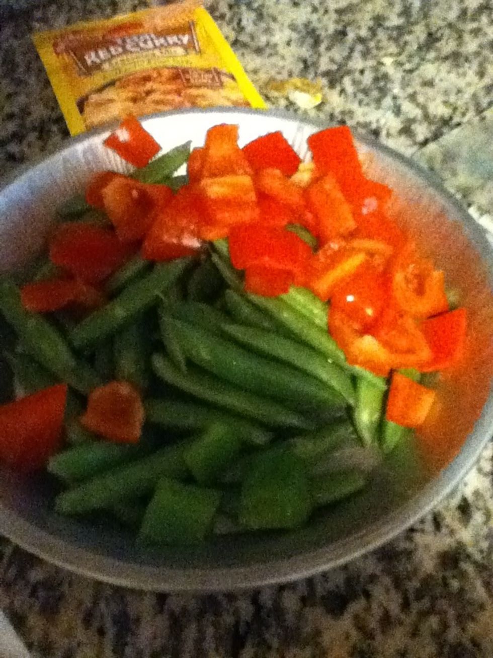 As you cut them put everything together. Leave the snow peas long.