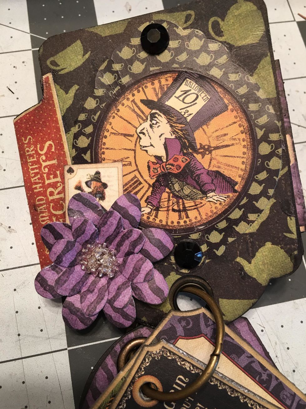 As you finish each tag page, add it to the ring of your album and arrange in the order that you want.