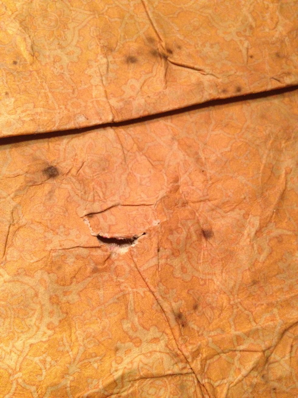 as you fold and pinch, distress here and there too. small holes will add great texture and interesting reveals thru to the next layer.