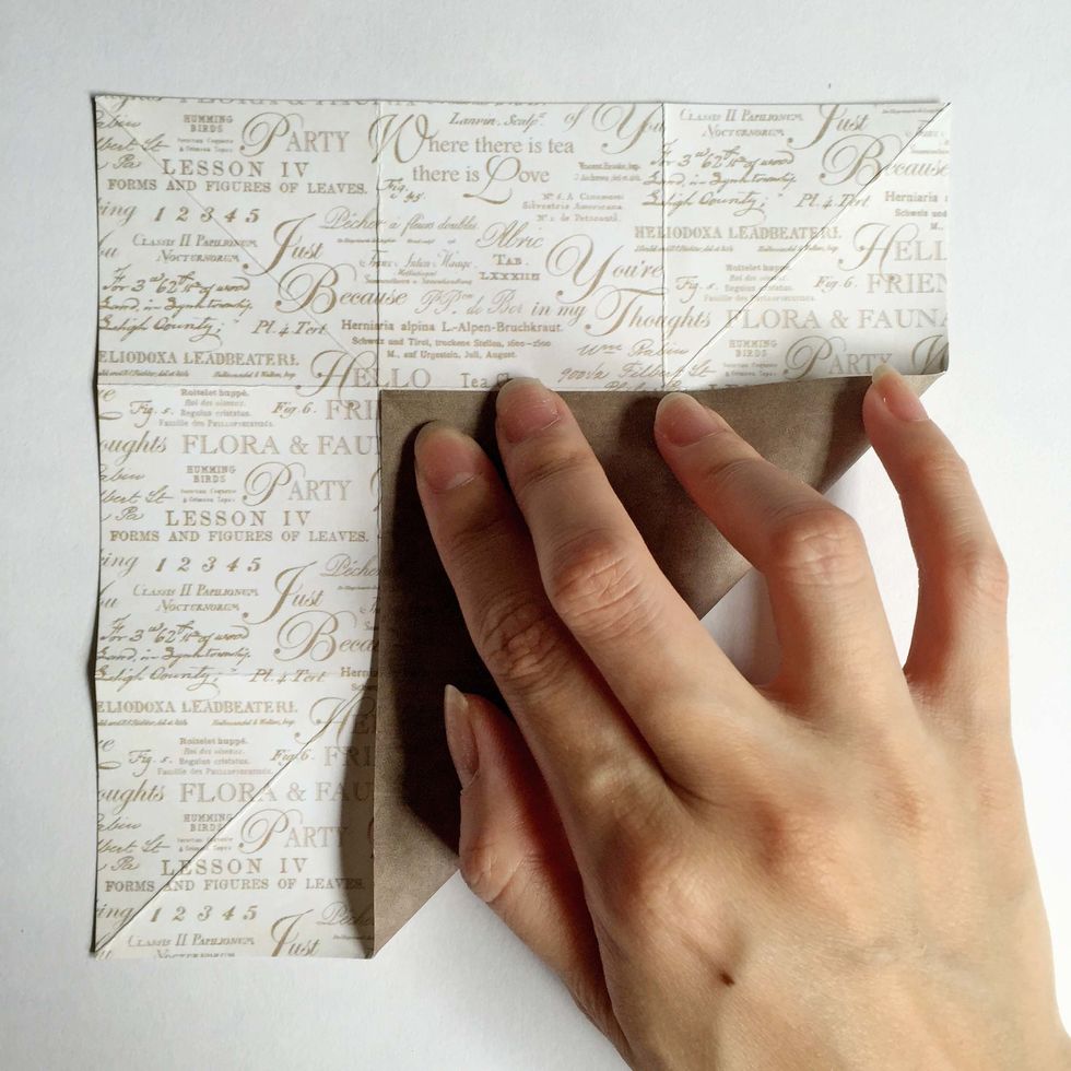 As you fold when the 2 corners touch, this is how it should look like...