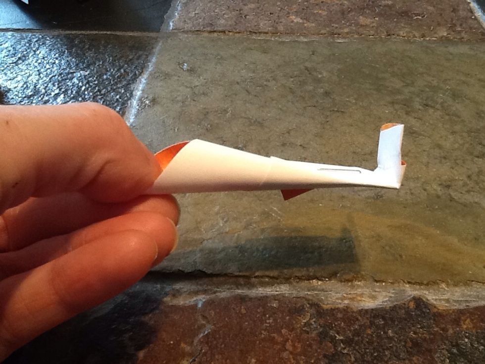 As you get towards the very middle of the flower, it works best to fold a little tab up just below your staple. This way the inner petals stand up and are easier to place in that tight middle space.