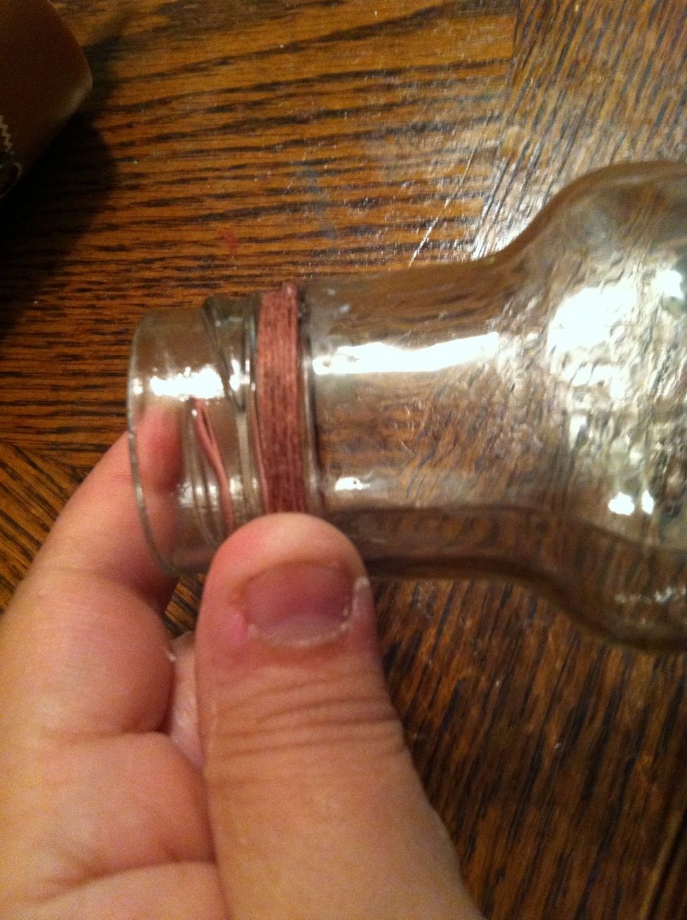 As you pass the glue smooth it over the string of choice (soc) going in the same direction.