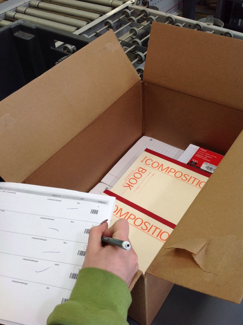 As you place the items into the carton, verify that the item description, item number and quantity of each item matches the order. Use the pen to check off that you have verified each item.