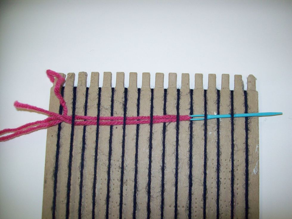 As you pull the needle all the way through, insure that the weft is UNDER every other warp.