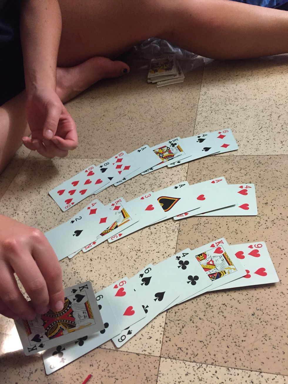 Ask your participant again which column the card they selected is in and then collecting the cards in the same fashion as before.