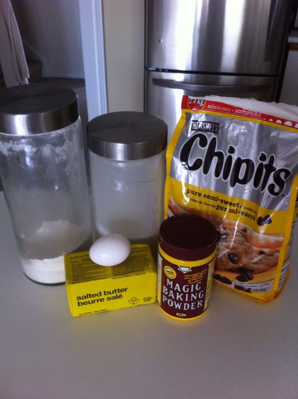 Assemble all the ingredients! Flour, sugar, butter, baking powder, chocolate chips, and an egg \ud83c\udf5a\ud83c\udf6b\ud83c\udf73